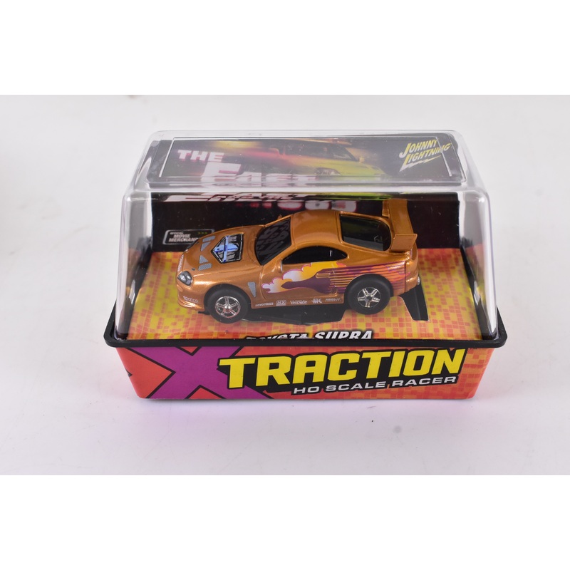 Toyota Supra Gold Xtraction Chassis Ho Scale Racer | Auto World