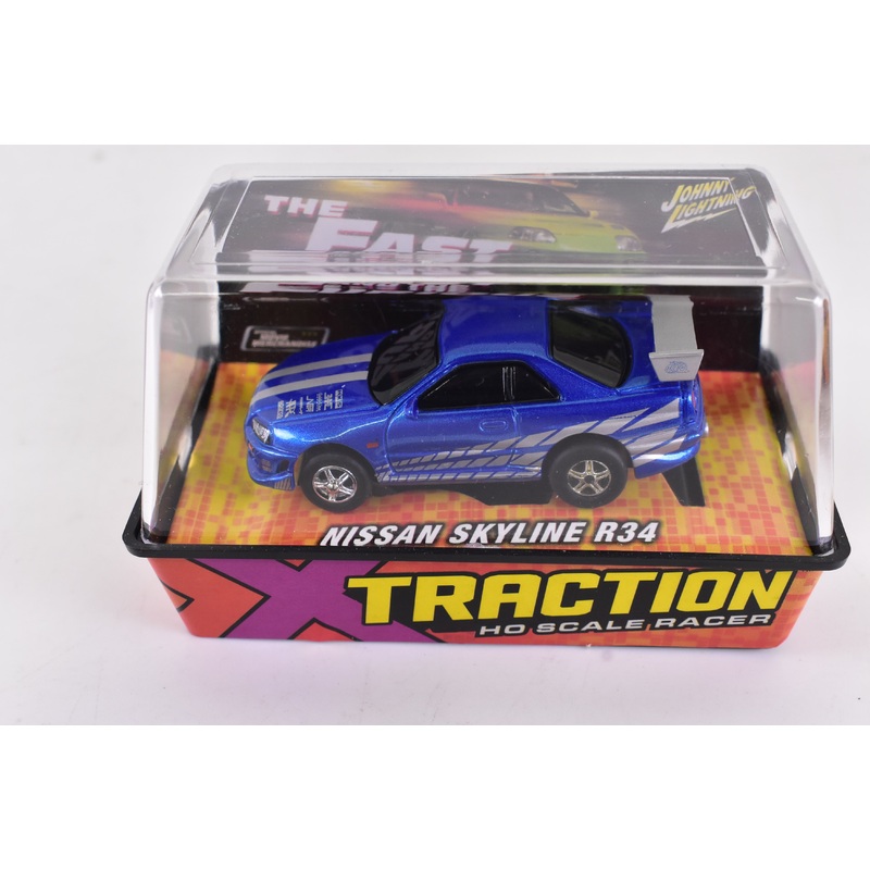 Nissan Skyline R34 Blue Xtraction Chassis Ho Scale Racer | Auto World