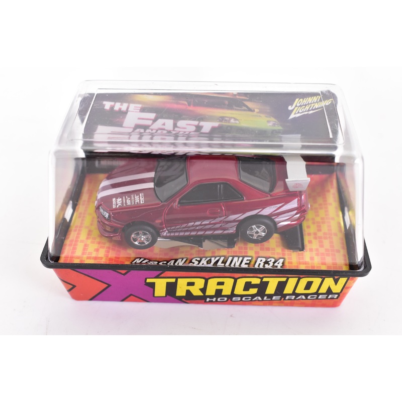 Nissan Skyline R34 Red Xtraction Chassis Ho Scale Racer | Auto World