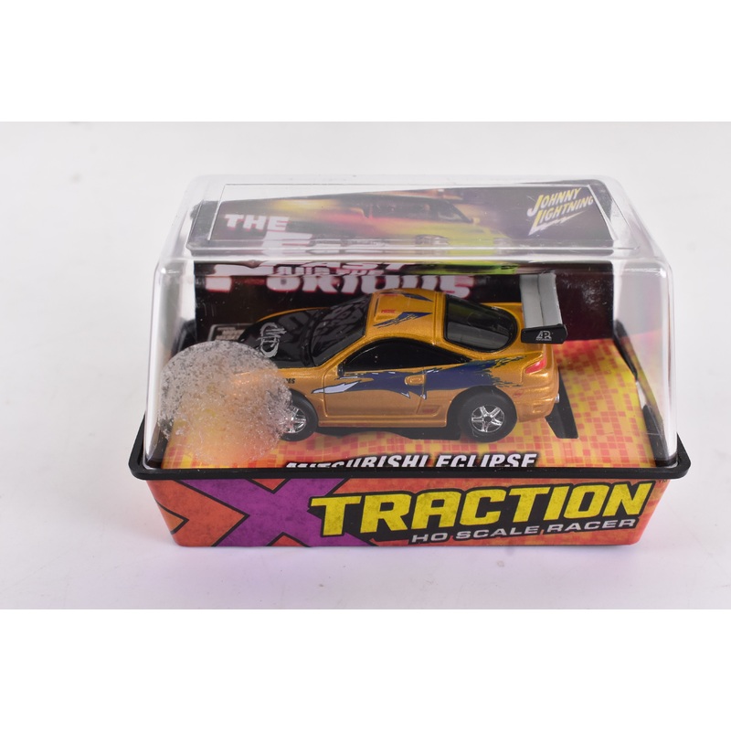 Mitsubishi Ecplipe Gold  Xtraction Chassis Ho Scale Racer | Auto World