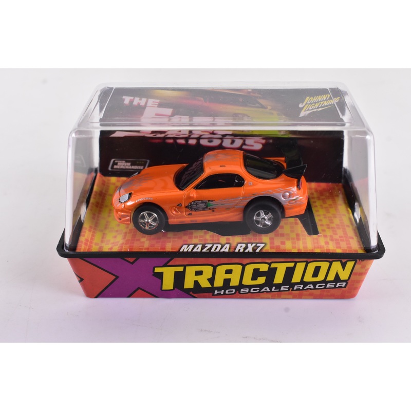 Mazda RX7 Orange Xtraction Chassis Ho Scale Racer | Auto World